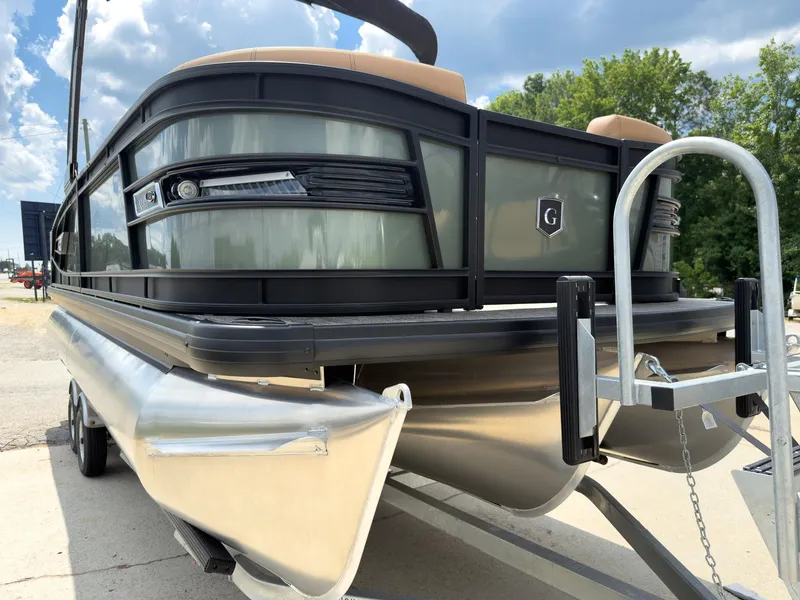 Slide: The Image of Luxurious interior of 2026 Godfrey AquaPatio 23' Flip Lounge Tritoon with elegant seating. - 4