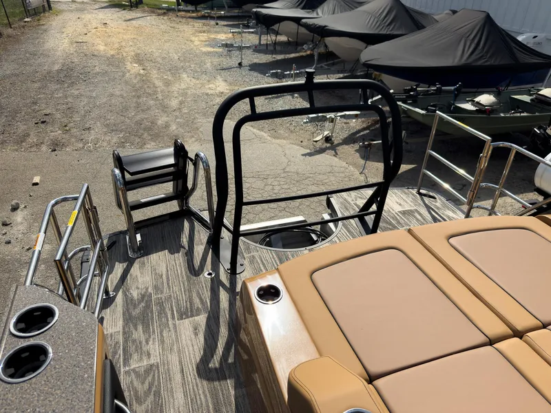 Slide: The Image of 2026 Godfrey AquaPatio 23' Flip Lounge Tritoon, sleek design under a cloudy sky. - 42