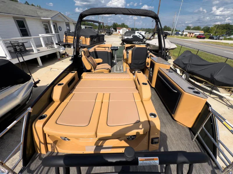 Slide: The Image of 2026 Godfrey AquaPatio 23' Flip Lounge Tritoon with luxurious seating and modern design. - 68