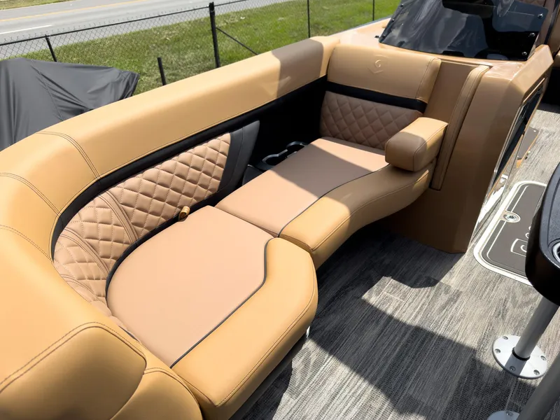 Slide: The Image of Luxurious interior of 2026 Godfrey AquaPatio 23' Flip Lounge Tritoon with elegant seating and lighting. - 7