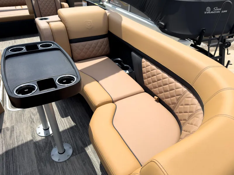 Slide: The Image of 2026 Godfrey AquaPatio 23' Flip Lounge Tritoon interior with luxurious seating and modern design. - 8