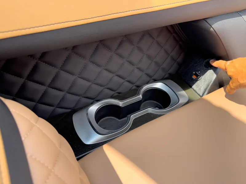 Slide: The Image of Luxurious interior of 2026 Godfrey AquaPatio 23' Flip Lounge Tritoon with plush seating and modern controls. - 9