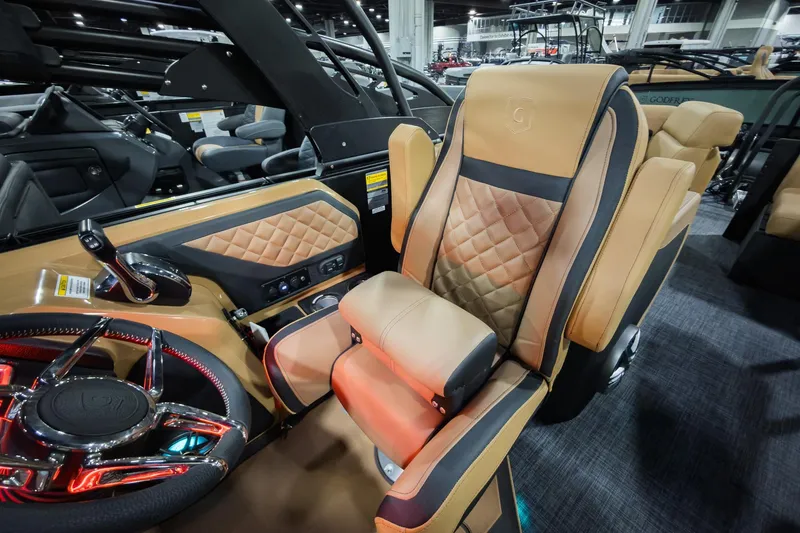 Slide: The Image of Luxurious interior of 2026 Godfrey Aquapatio 235 ULC Tritoon with premium seating and controls. - 16