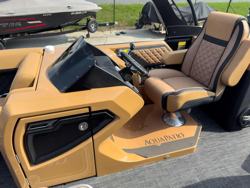 Slide: The Image of 2026 Godfrey Aquapatio 235 ULC Tritoon with luxurious seating and sleek design. - 35