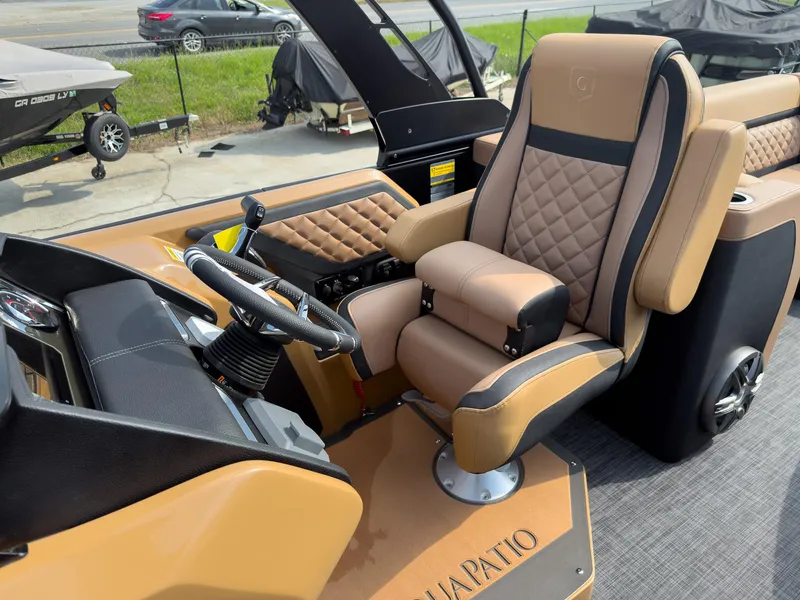 Slide: The Image of Luxurious seating on 2026 Godfrey Aquapatio 235 ULC Tritoon, featuring tan upholstery and quilted accents. - 37