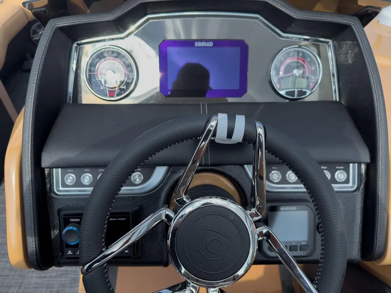 Slide: The Image of Luxurious seating on 2026 Godfrey Aquapatio 235 ULC Tritoon, featuring tan upholstery and cup holders. - 39