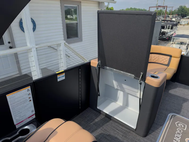 Slide: The Image of Luxurious 2026 Godfrey Aquapatio Tritoon with plush seating and modern dashboard. - 45