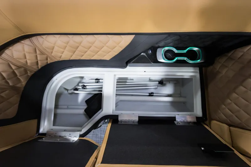 Slide: The Image of 2026 Godfrey Aquapatio 235 ULC Tritoon interior storage with quilted seating and illuminated cup holders. - 5