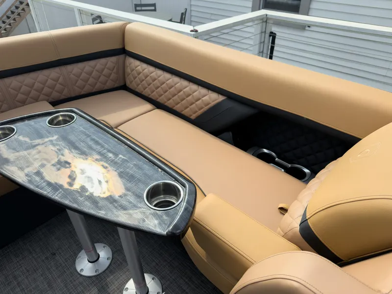 Slide: The Image of Control panel with chilled cupholder and canopy switches on 2026 Godfrey Aquapatio Tritoon. - 53