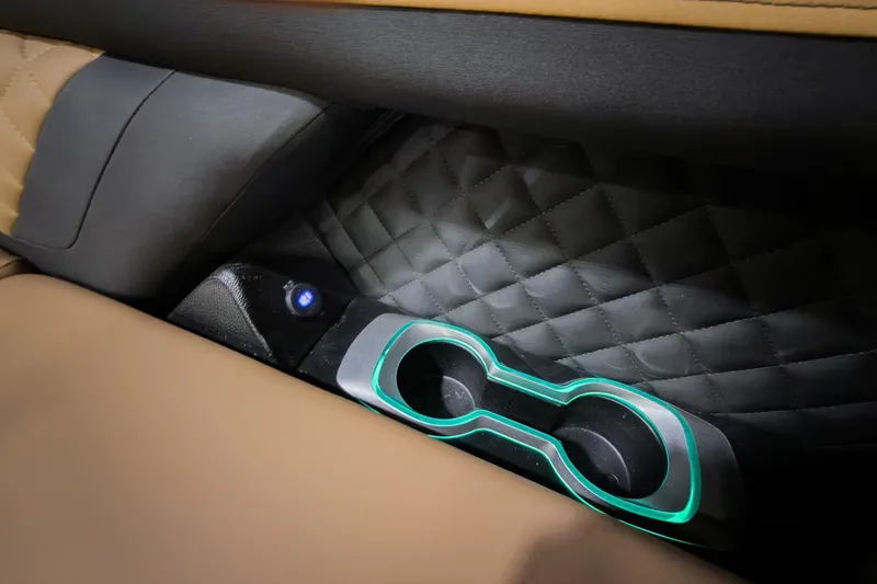 Slide: The Image of Illuminated cup holder in 2026 Godfrey Aquapatio 235 ULC Tritoon with quilted upholstery. - 6