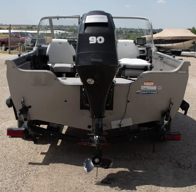 Slide: The Image of 2013 Crestliner 1650 Fish Hawk boat with Mercury 90 engine, rear view. - 4