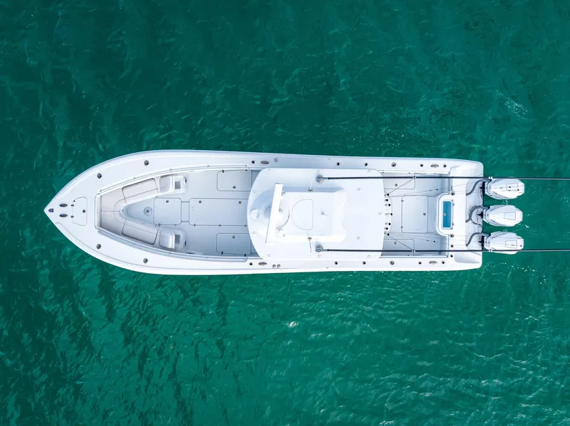 Slide: The Image of Aerial view of 2023 Yellowfin 36 boat on turquoise water. - 16