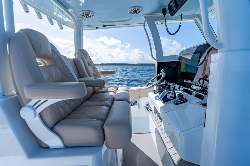 Slide: The Image of Luxurious interior of 2025 Freeman 35 boat with plush seating and advanced navigation controls. - 23