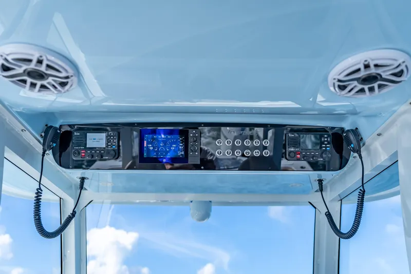 Slide: The Image of 2025 Freeman 35 boat dashboard with advanced navigation and communication systems. - 24