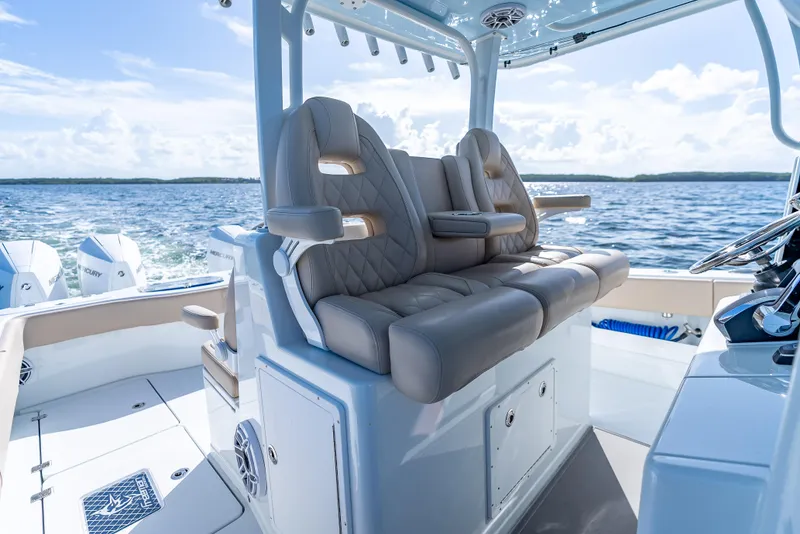 Slide: The Image of Luxurious seating on a 2025 Freeman 35 boat, with ocean view and modern design. - 25