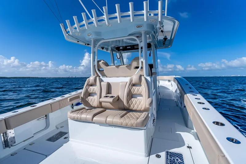 Slide: The Image of 2025 Freeman 35 boat interior with luxurious seating on open water. - 31