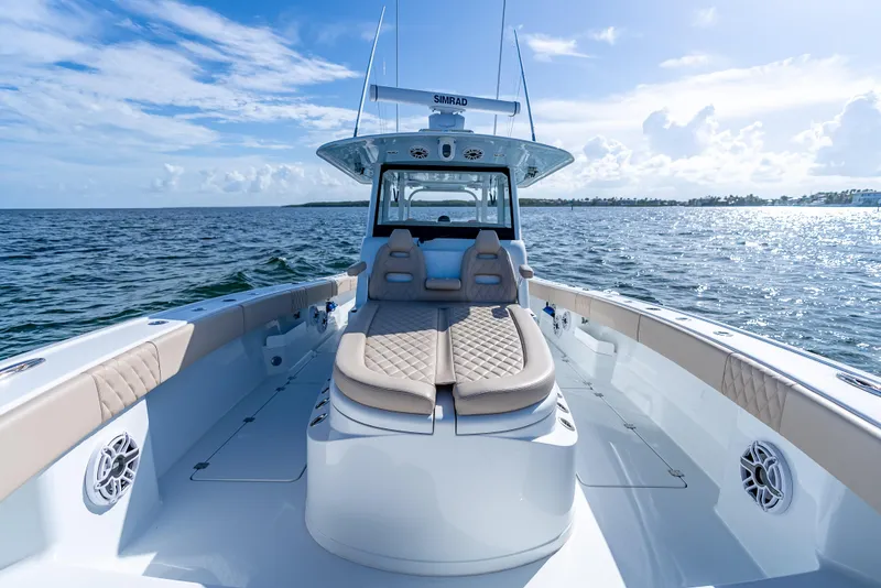 Slide: The Image of 2025 Freeman 35 boat with luxurious seating on open water. - 42