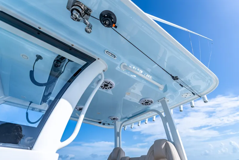 Slide: The Image of Freeman 35 boat roof detail against blue sky, 2025 model. - 49