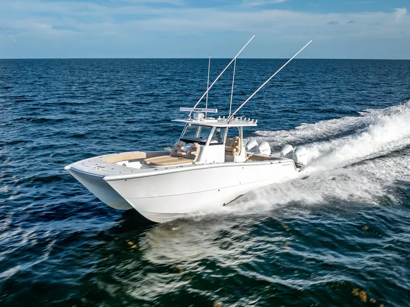 Slide: The Image of 2025 Freeman 35 boat cruising on open ocean, showcasing sleek design and powerful performance. - 5