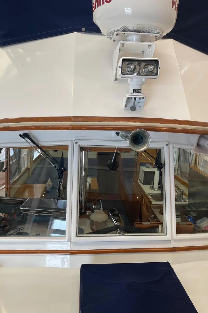 Slide: The Image of 1969 Grand Banks 36 Classic boat interior with navigation equipment and radar. - 11