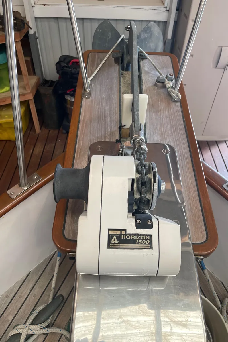 Slide: The Image of Anchor winch on 1969 Grand Banks 36 Classic boat deck. - 13