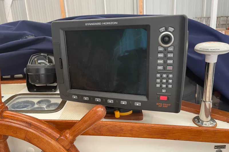 Slide: The Image of Standard Horizon GPS Chart CP590 on 1969 Grand Banks 36 Classic boat dashboard. - 17