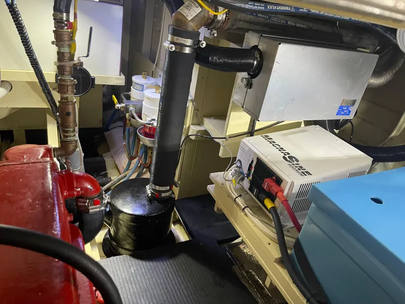 Slide: The Image of Engine room of a 1969 Grand Banks 36 Classic with visible machinery and components. - 26