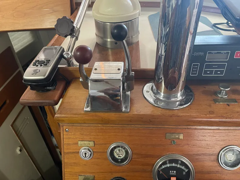 Slide: The Image of Control panel of a 1969 Grand Banks 36 Classic boat with navigation instruments. - 42