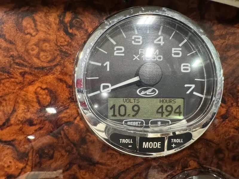 Slide: The Image of Close-up of 2006 Sea Ray 290 SLX tachometer showing 10.9 volts and 494 hours. - 15