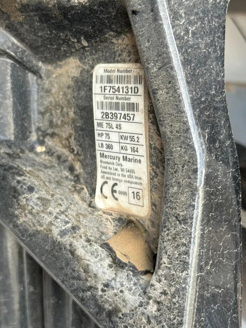 Slide: The Image of Label on a 2017 Bayliner Element E16, showing model and serial numbers. - 18