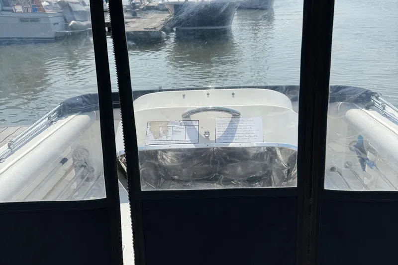 Slide: The Image of 1994 Albin 28 Tournament Express boat interior view at marina. - 5