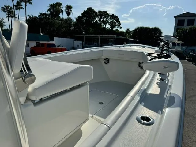 Slide: The Image of 2026 Pair Customs 24 Center Console DV boat with sleek white seating and modern design. - 6