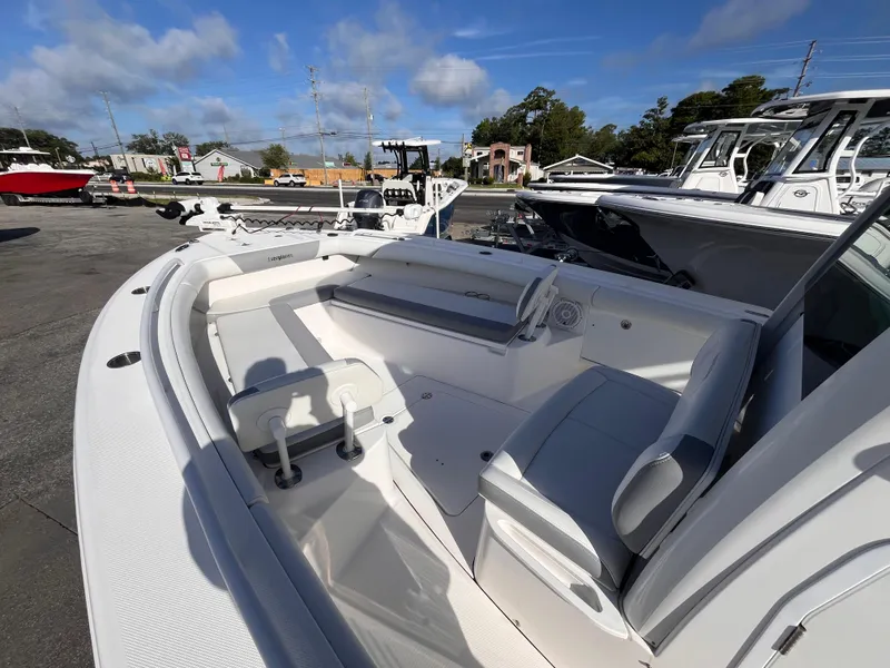 Slide: The Image of 2017 Everglades 273 Center Console boat with spacious seating and modern design. - 12