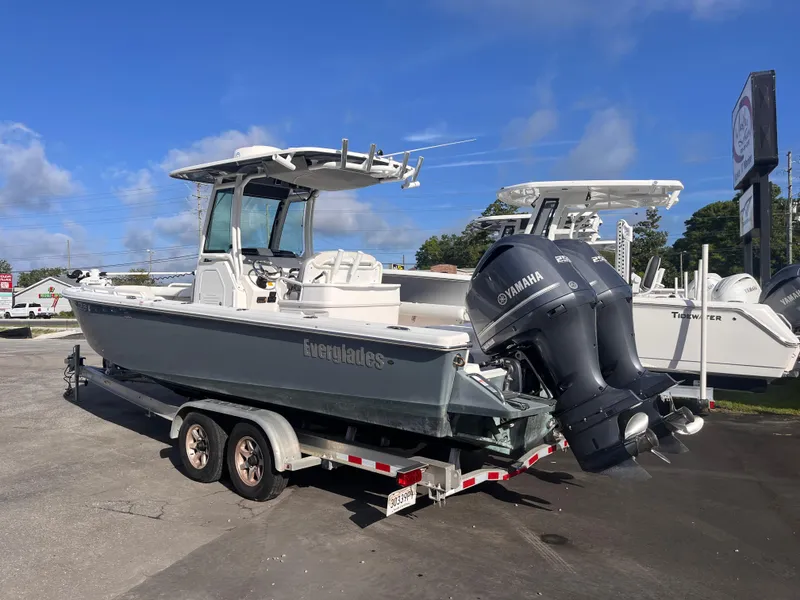 Slide: The Image of 2017 Everglades 273 Center Console boat with dual Yamaha engines on a trailer. - 2