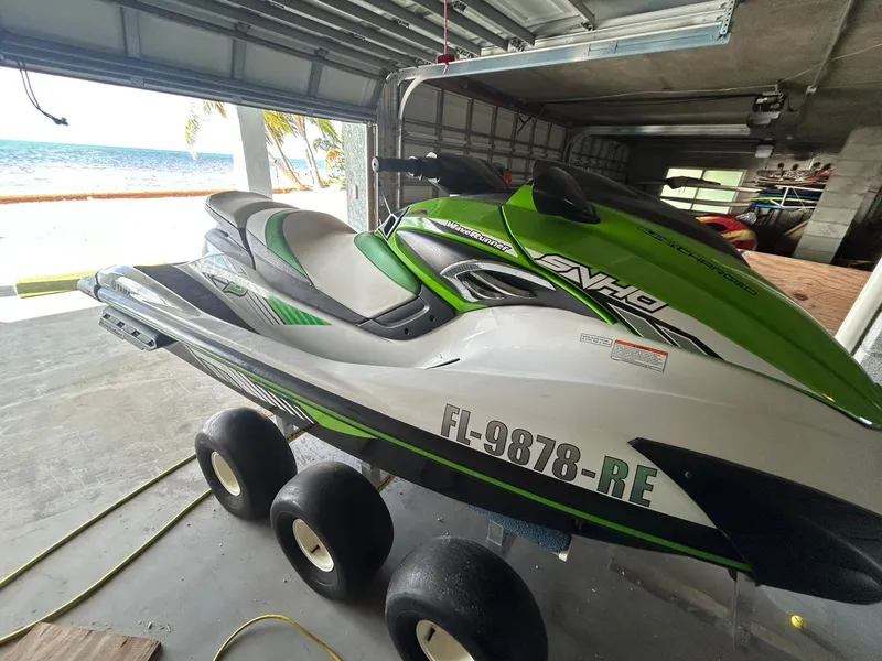 Slide: The Image of 2017 Yamaha WaveRunner FZS in garage, ocean view in background. - 6