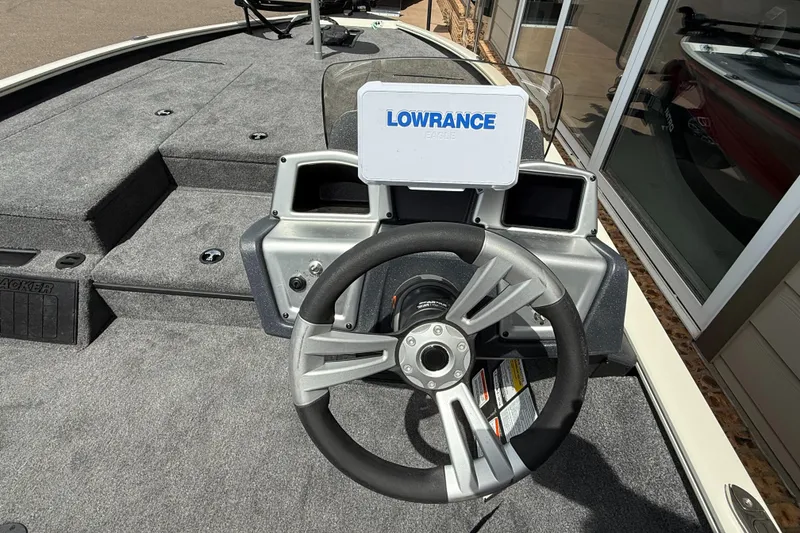 Slide: The Image of Steering console of 2025 Tracker Savage 215 boat with Lowrance display. - 4