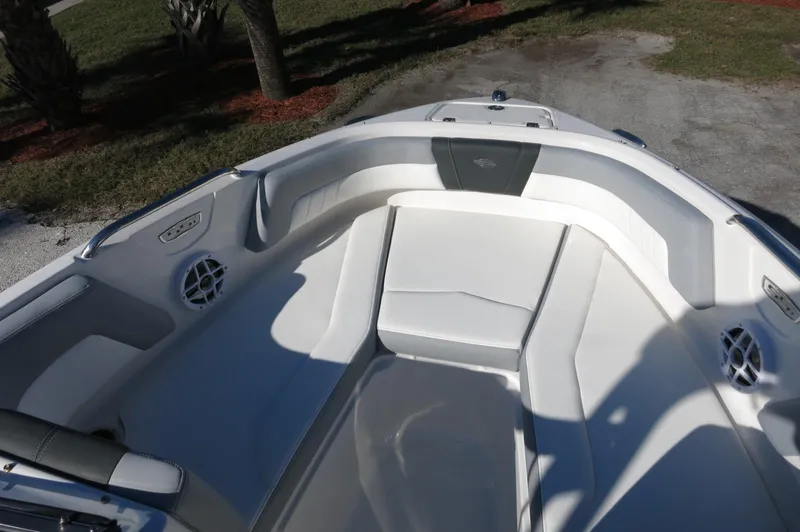 Slide: The Image of 2025 Chaparral 21 SSi Outboard boat interior with spacious seating and modern design. - 22