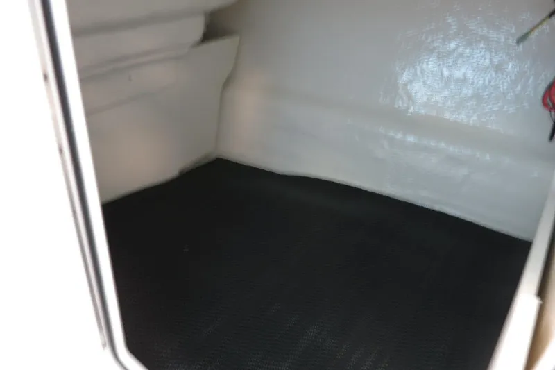 Slide: The Image of Interior storage compartment of 2025 Chaparral 21 SSi Outboard boat. - 50