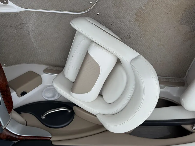 Slide: The Image of 2005 Four Winns Horizon 200 boat interior with white and beige seating. - 19