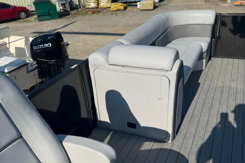 Slide: The Image of 2023 Bentley Pontoons 250 Elite Admiral with gray seating and Suzuki outboard motor. - 6