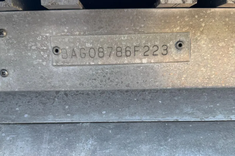 Slide: The Image of 2023 Bentley Pontoons 250 Elite Admiral hull identification number plate. - 9