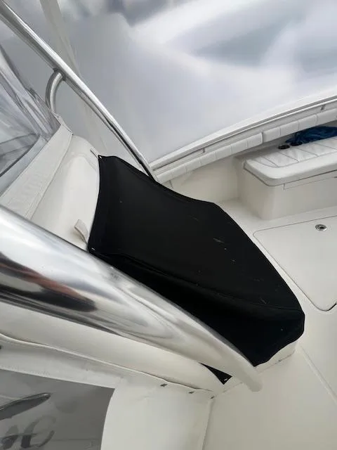 Slide: The Image of 2015 Regulator 23 Forward Seating boat interior with black seat cover. - 12