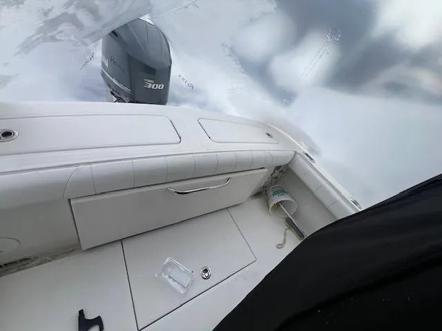 Slide: The Image of 2015 Regulator 23 Forward Seating boat interior with Yamaha 300 engine. - 22