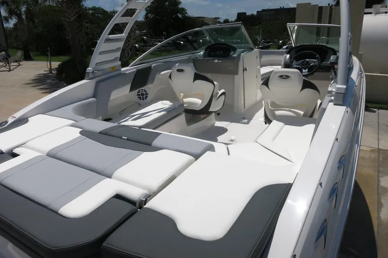 Slide: The Image of 2025 Chaparral 23 SSi OB boat interior with sleek seating and modern design. - 13