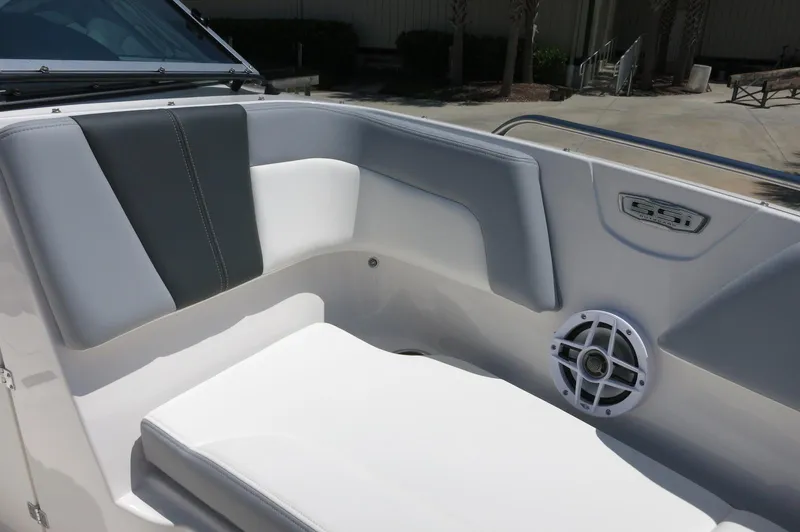 Slide: The Image of Interior seating of 2025 Chaparral 23 SSi OB boat with speaker detail. - 19