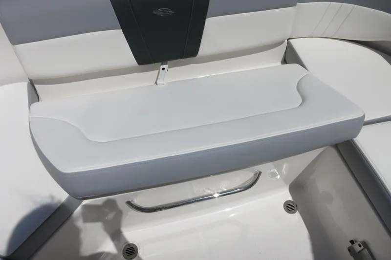 Slide: The Image of 2025 Chaparral 23 SSi OB boat seat with sleek white and gray upholstery. - 36