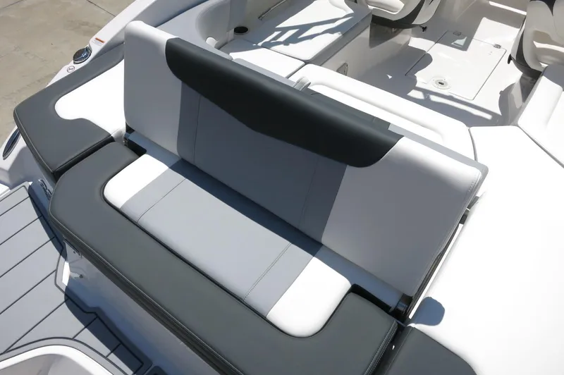 Slide: The Image of 2025 Chaparral 23 SSi OB boat interior with sleek, modern seating design. - 40