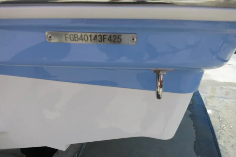 Slide: The Image of 2025 Chaparral 23 SSi OB boat hull with identification number visible. - 8