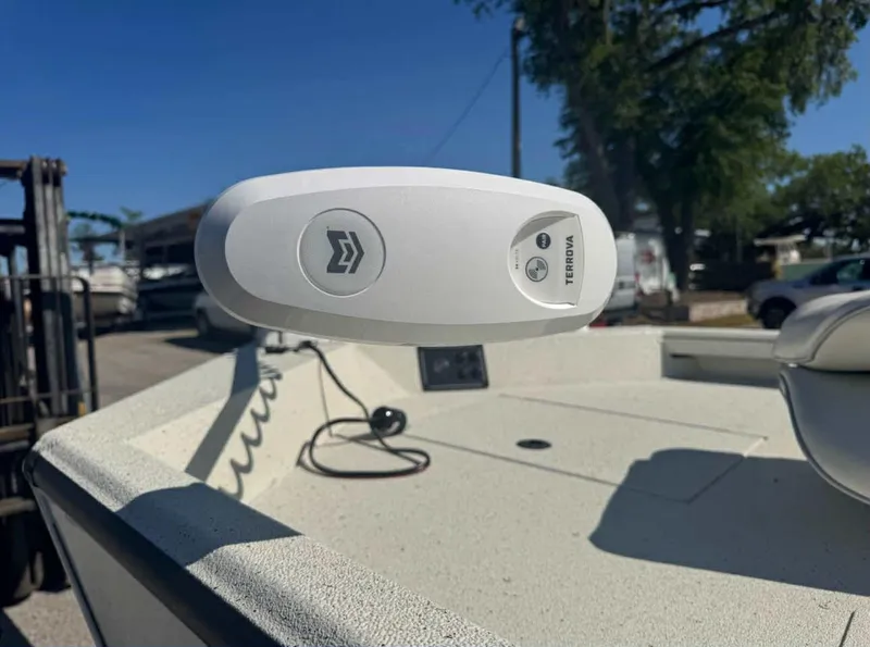 Slide: The Image of 2025 Ranger RB210 boat interior with seating and console, featuring Lowrance equipment. - 3