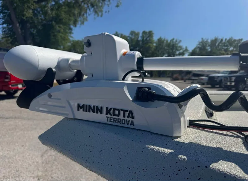 Slide: The Image of 2025 Ranger RB210 boat console with steering wheel and navigation equipment. - 5